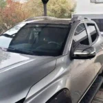 Barras de techo para camioneta mitsubishi l200 (2006 - 2024) imagen real de las barras instaladas en una camioneta gris