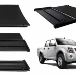 Vista lateral de la tapa plegable trifold para chevrolet dmax del 2006 al 2015 con camioneta gris a un costado