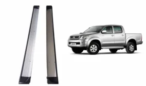 Pisaderas para pick up toyota hilux vigo del 2005 al 2015 con una camioneta gris al costado