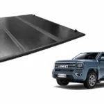 Tapa plegable trifold para camioneta jmc grand avenue del 2023 al 2025 con una camioneta de color azul al costado